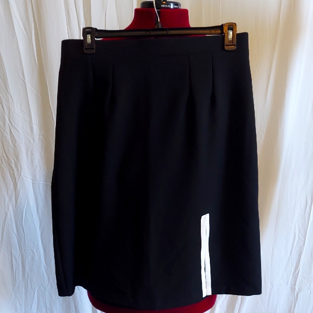 Custom tailored black slim skirt with white accent front split. Size 1X